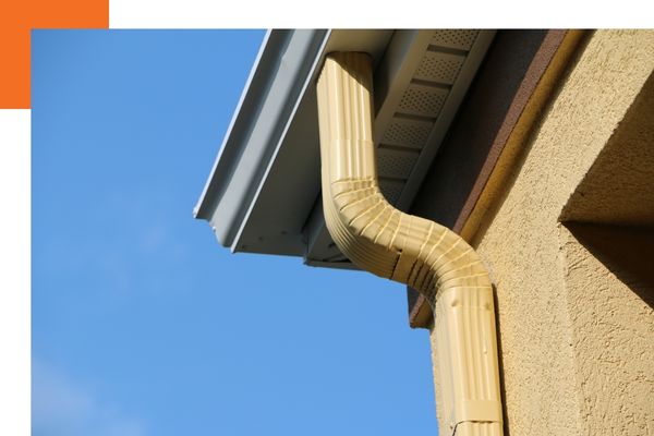 A newly installed gutter on a building