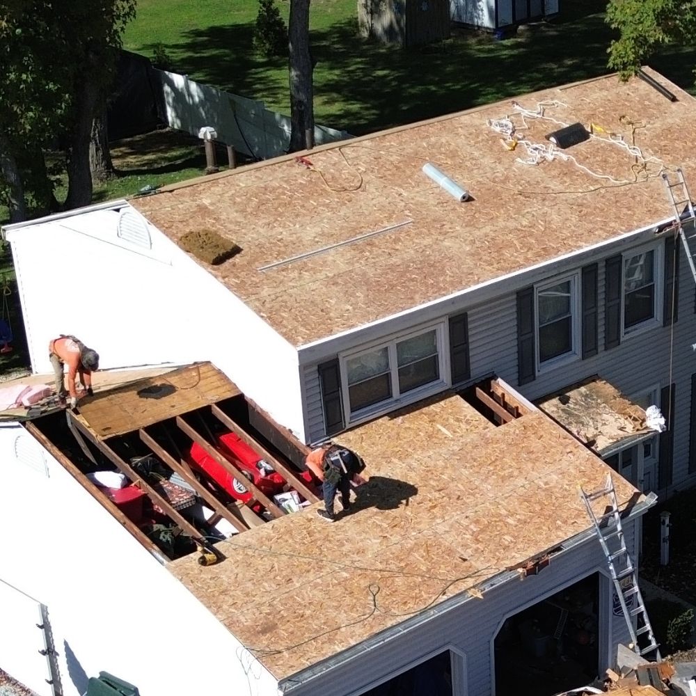 The Third Estimate Crew installing a new roof in Northeast Ohio.